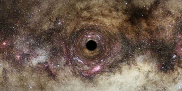 O gaură neagră ultra-masivă, cu o masă „de 30 de miliarde de ori mai mare” decât cea a Soarelui, descoperită de astronomi britanici
